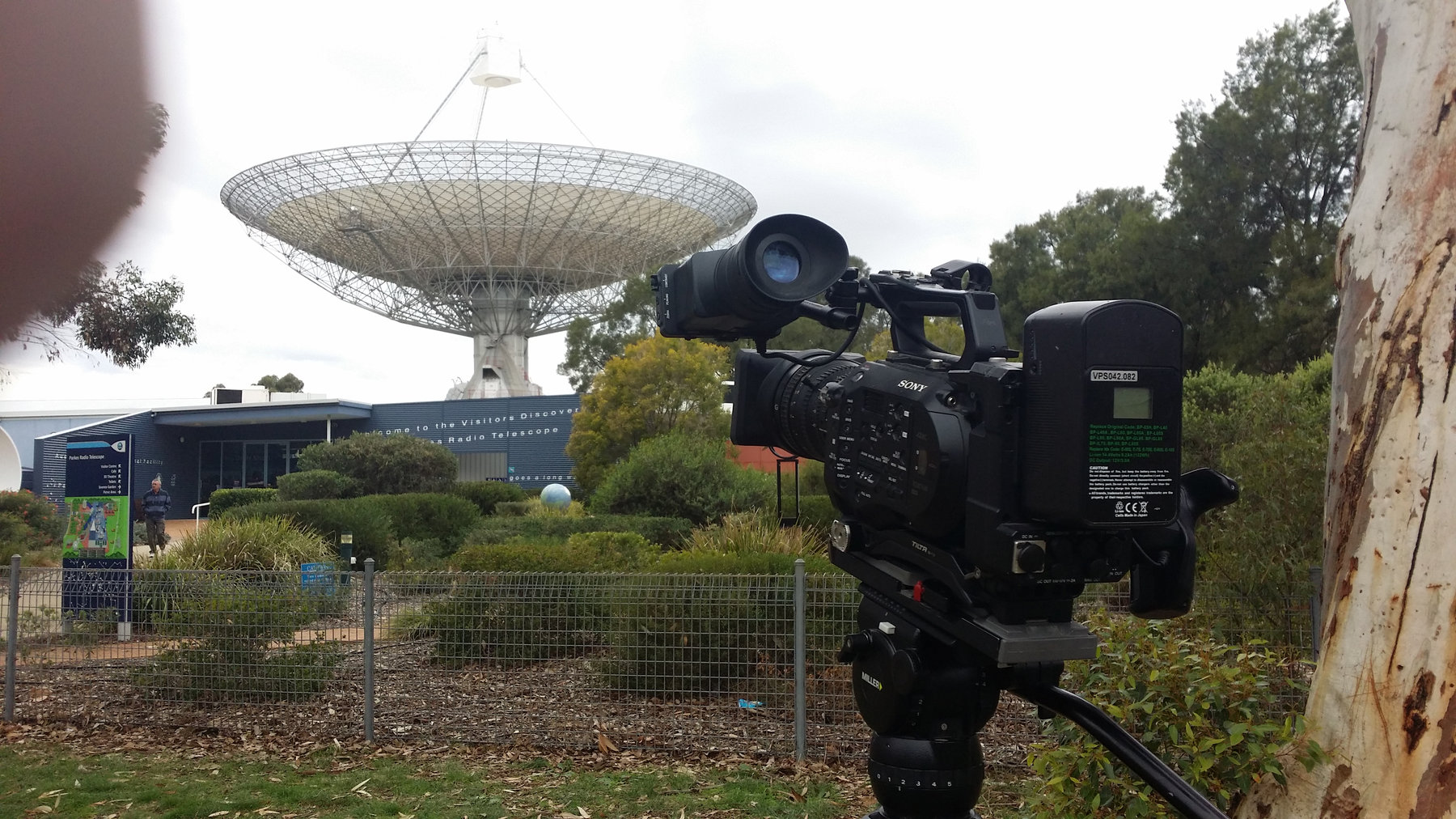 Broadcast camera set up in front of the Parkes radio telescope